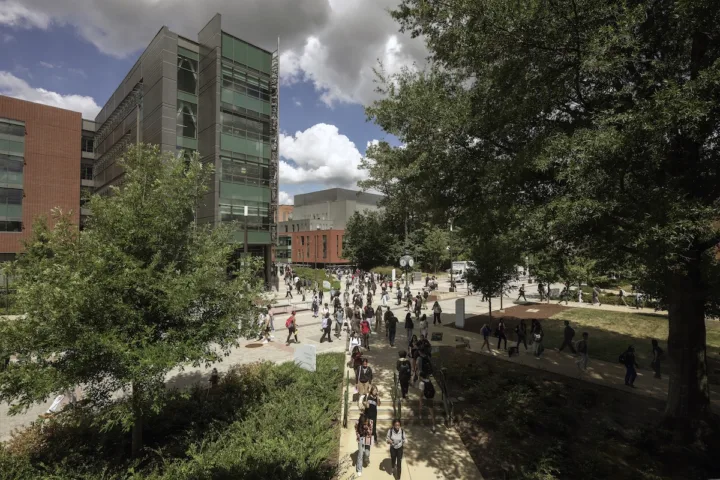 Students walking on the Roger Wilkins plaza in front of Horizon Hall on the Fairfax Campus. Photo by Evan Cantwell/George Mason University