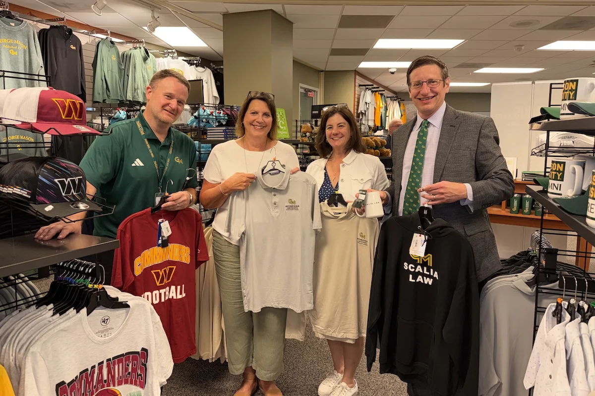 Antonin Scalia Law School staff members posing at the Campus Store Mason Square location.