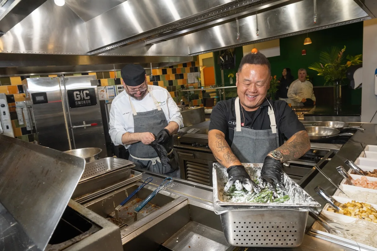 Chef Jet Tila and Southside Dining chefs prepare and cook Orange Flavored Chicken Thighs, Nasi Goreng, Fried Rice, Green Beans Szechuan Style for students on the Fairfax Campus.