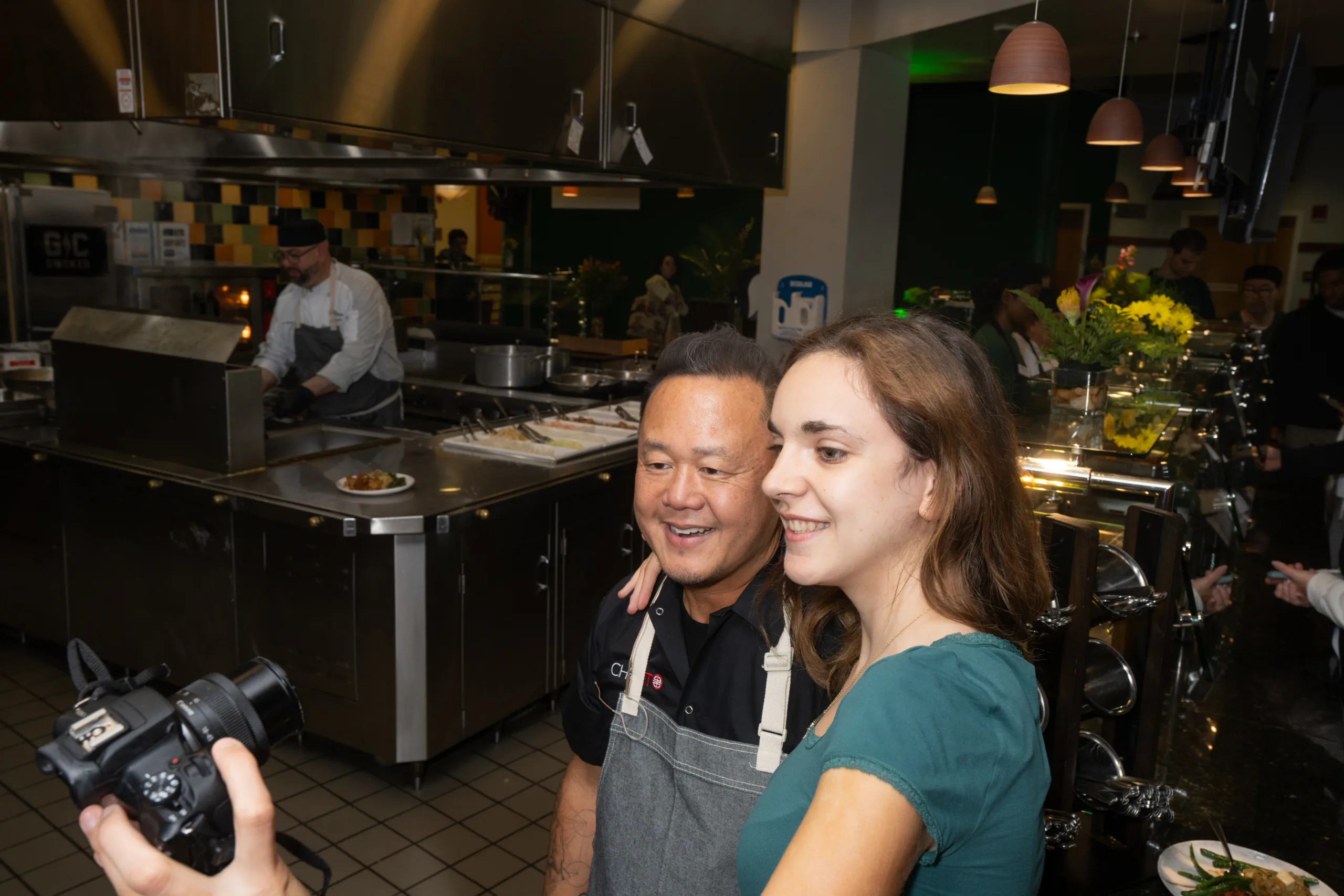 Chef Tila posed for a selfie with a student fan.