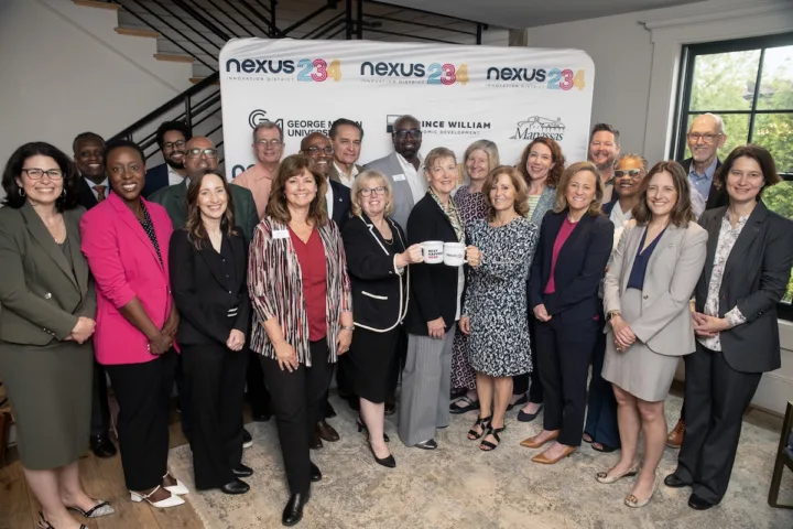 Founders pose for a group photo at the Nexus234 Innovation District naming event.