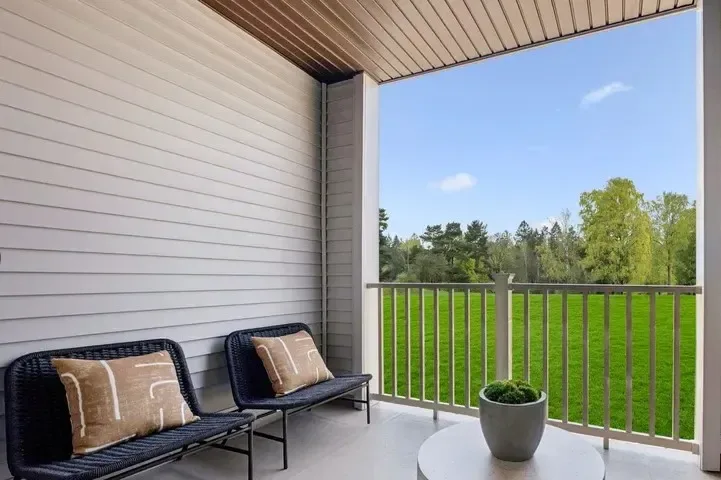 The townhome features with a balcony overlooking the natural scenery of the Shenandoah region.